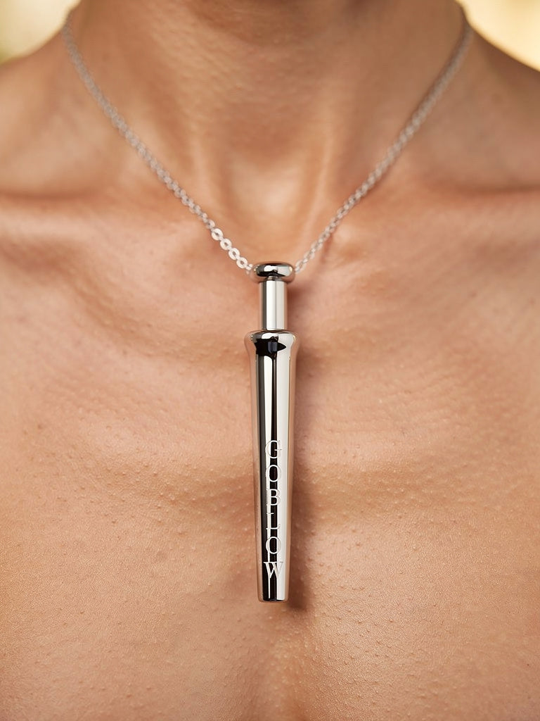 GoBlow Steel pendant — editorial close-up chest worn