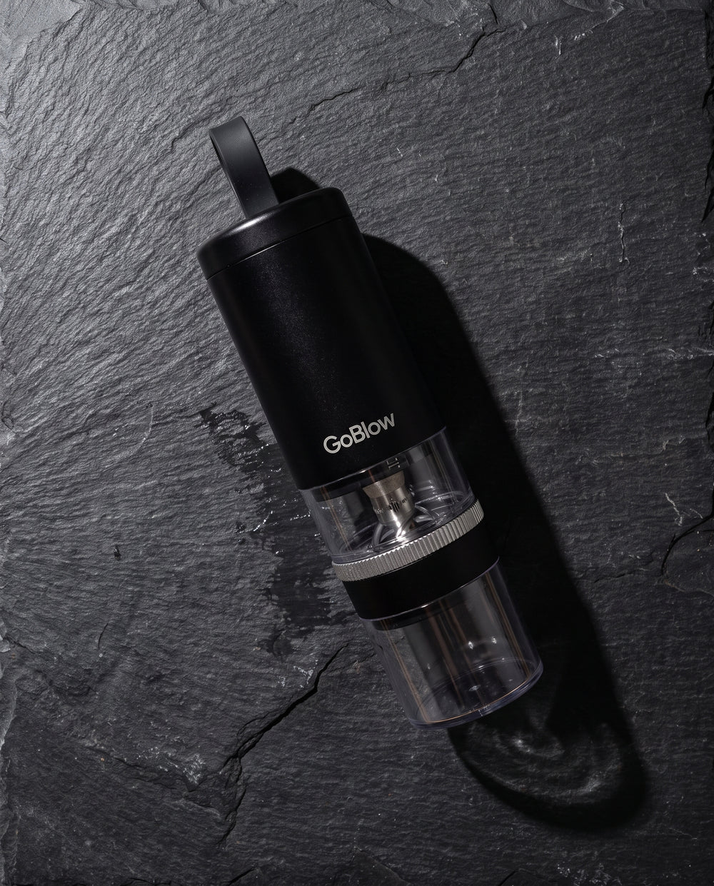 GoBlow Precision Device flat lay on dark slate