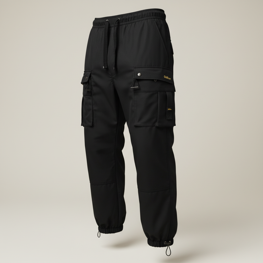 The Cargo Pant — front (flap + magnetic snap + webbing tab on both thigh pockets)
