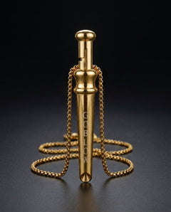 GoBlow Pendant MKII in Gold, studio hero — machined stainless EDC capsule pendant
