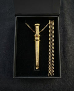 GoBlow Pendant MKII in Gold, in its gift box — machined stainless EDC capsule pendant