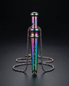 GoBlow Pendant MKII in Rainbow, studio hero — machined stainless EDC capsule pendant