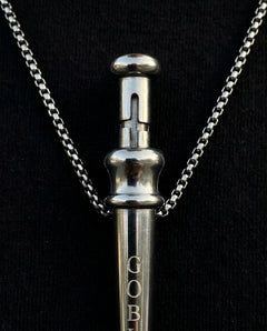 GoBlow Pendant MKII in Steel, macro of the bayonet slot — machined stainless EDC capsule pendant