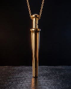 GoBlow MKII Gold — front — machined stainless EDC capsule pendant