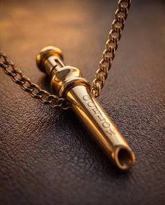 GoBlow MKII Gold — macro with chain — machined stainless EDC capsule pendant