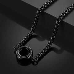 GoBlow Necklace — black chain and ring pendant, dark studio — machined stainless EDC capsule pendant