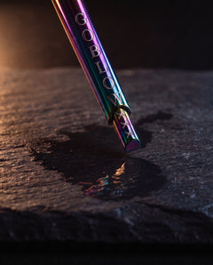 GoBlow MKII Rainbow — extended detail — machined stainless EDC capsule pendant
